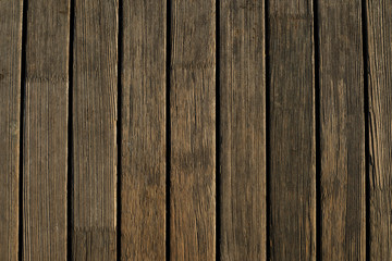 Wooden texture. Old terrace board. Background of old natural wooden dark empty deck with messy and...