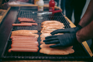 Delicious fresh hot dogs on the grill
