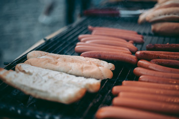 Delicious fresh hot dogs on the grill