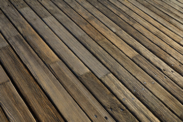 Fototapeta premium Wooden texture. Old terrace board. Background of old natural wooden dark empty deck with messy and grungy crack beech, oak tree floor texture inside vintage, retro perfect blank.