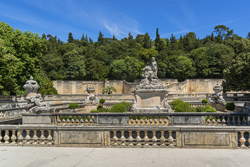 Fototapeta na wymiar Remarkable garden and first public garden in Europe: Jardin de la Fontaine (1738 - 1755) in Nimes. Nimes, Occitanie region of southern France.
