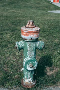 Old Green Fire Hydrant In The City