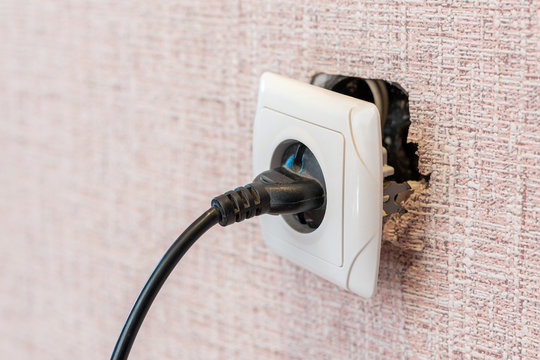 Plug in a broken outlet, risk of electric shock