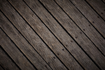 Obraz premium Wooden texture. Old terrace board. Background of old natural wooden dark empty deck with messy and grungy crack beech, oak tree floor texture inside vintage, retro perfect blank.