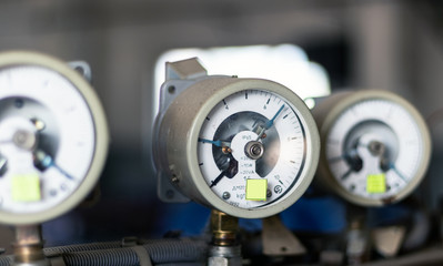 Industry. Measuring instruments fixed in a row. Close-up.