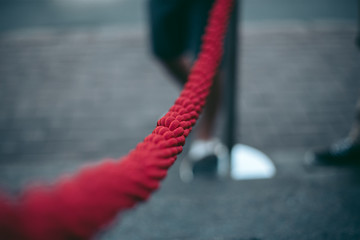 Red security rope to pass people