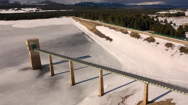 Aerial view frozen water reservatory, Pyrenees, France.