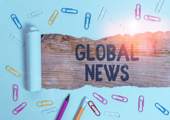 Handwriting text writing Global News. Conceptual photo world noteworthy information about recent or...
