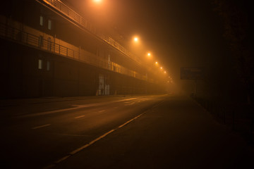 Highway at night in the fog in the city