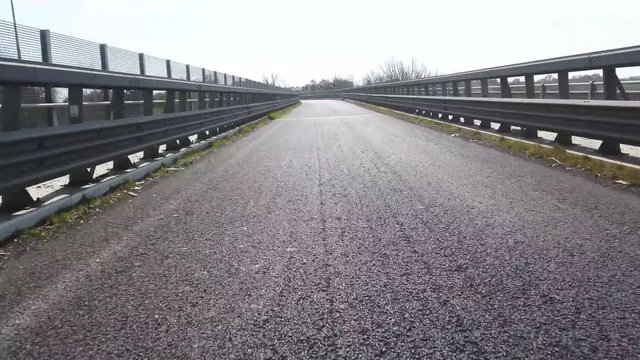 a video shot with poket osmo by a car in traffic in the city of Rome