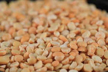 Yellow dry and fresh peas in a stock