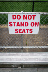No standing sign by the bleachers