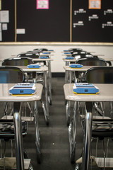 Row of desks with calculators
