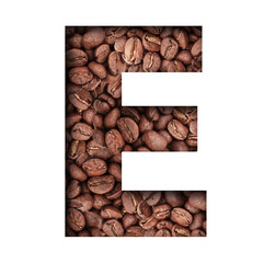 Stencil of the letter E on a background of coffee beans