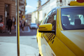 Yellow taxi car in the city center