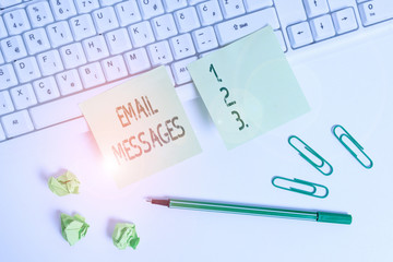 Handwriting text writing Email Messages. Conceptual photo a messages that has been sent using electronic mail Square green note paper with pencil on the white background