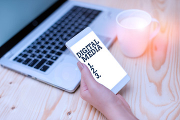 Conceptual hand writing showing Digital Media. Concept meaning digitized content that can be...