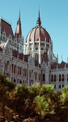Fototapeta premium Budapest Parliament Building in the afternoon against a clear blue sky