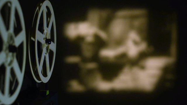 Movie projector broadcasts a sepia tone film