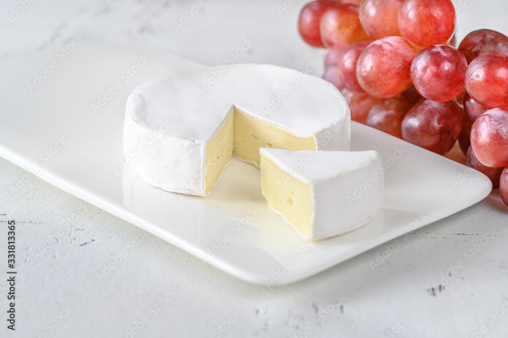 Wall mural Camembert on the serving plate