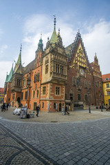 The Market Square in the city center of Wrocław city in Poland. in the picture you see the old colorful buildings and the Old town hall building