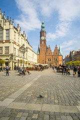 The Market Square in the city center of Wrocław city in Poland. in the picture you see the old colorful buildings and the Old town hall building
