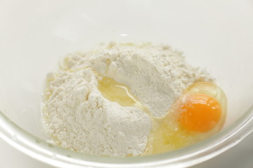 flour and egg with butter for pan cake cooking