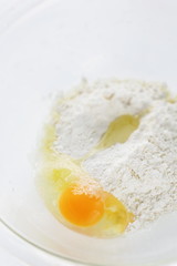 flour and egg with butter for pan cake cooking