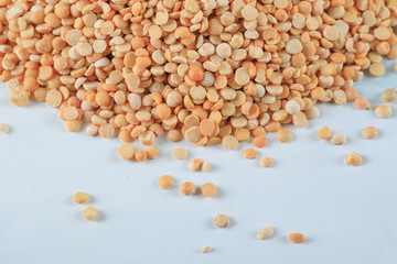 Yellow beans spread over the marble