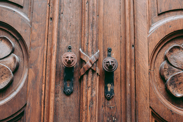 Fototapeta premium Old wooden door with carvings