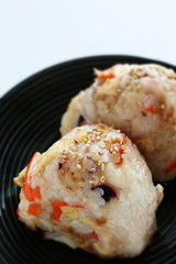 Japanese food, chicken and carrot rice ball on dish