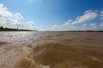 On the Mekong river at Vietnam. Crossing the Mekong river near the city of Saigon or Ho Chi Ming...