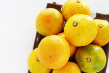 Japanese fruit, mandarine orange on white background 