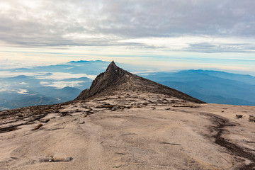 At the peak of Mount Kinabalu, Sabah, Borneo, Malaysia. The Mt Kinabalu is  with 4095 meter above sea level, the highest mountain in south east Asia,  located 50km away from Kota Kinabalu