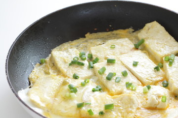 Japanese food, tofu and egg pan fried with green onion