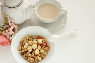 Healthy breakfast, granola celery in blow with copy space