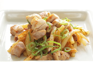Korean food, potato and chicken stir fried with Kimchi