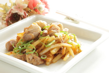 Korean food, potato and chicken stir fried with Kimchi