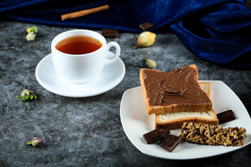 Chocolate cream toast served with a cup of tea
