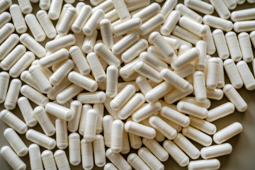 Fototapeta na wymiar Pile of white medicinal pills