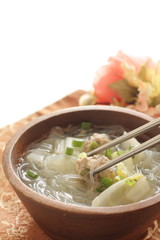 Meat pork, rice noodles, noodles, meat, soup, wooden bowl, bowl, asian food, chinese food, food, vegetable, vermicelli, radish, daikon,
white background, copy space, still life, healthy,japanese food,