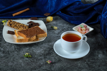 Chocolate cream toast with a cup of tea
