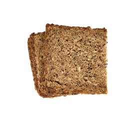 Slices of wholemeal dark bread isolated on a white background in close-up 