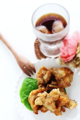 Asian food, fried chicken on dish with copy space
