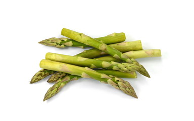 green asparagus isolated on white. Bunch of Raw Garden Asparagus with Shadow Isolated. Fresh Green Spring Vegetables on White Background.