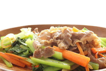 Pork and green leaf vegetable stir fried with carrot
