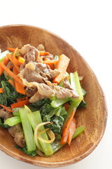 Pork and green leaf vegetable stir fried with carrot