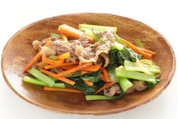 Pork and green leaf vegetable stir fried with carrot