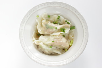 Chinese dumpling, jioazi in bowl with copy space
