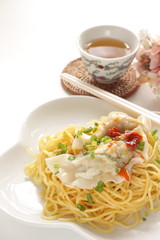Chinese food, jiozi dumpling and noodles with chili sauce 